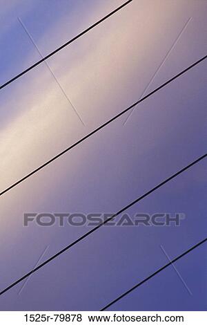 Low angle view of power lines View Large Photo Image Stock Photo - Low angle view of power lines. Fotosearch