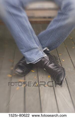 Low section view of a person's leg View Large Photo Image Stock Image - Low section view of a person's leg. Fotosearch