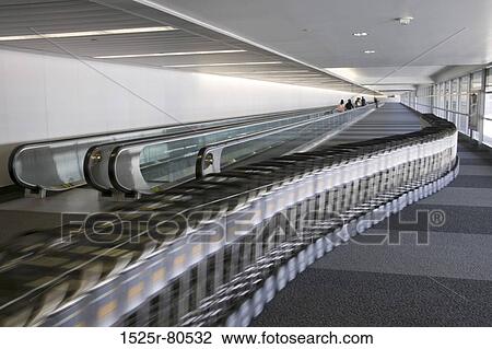 Moving walkway in an airport View Large Photo Image Stock Image - Moving walkway in an airport. Fotosearch