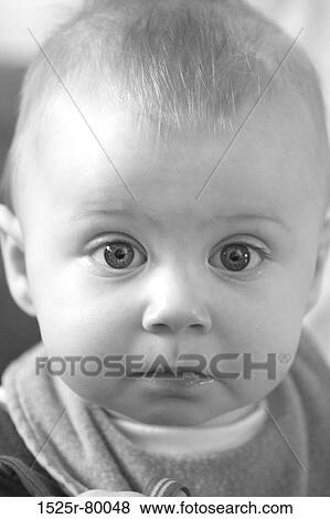 Portrait of a baby boy looking surprised View Large Photo Image Stock Photo - Portrait of a baby boy looking surprised. Fotosearch