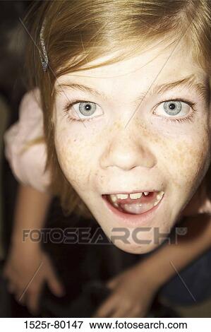 Portrait of a girl looking surprised View Large Photo Image Stock Photo - Portrait of a girl looking surprised. Fotosearch