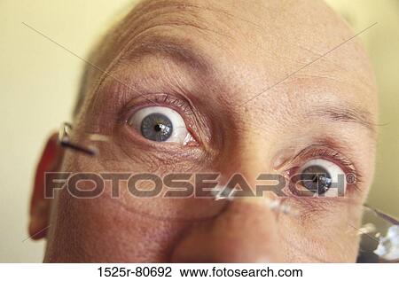 Portrait of a mature man staring View Large Photo Image Stock Image - Portrait of a mature man staring. Fotosearch