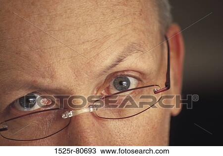Portrait of a mature man staring View Large Photo Image Stock Image - Portrait of a mature man staring. Fotosearch