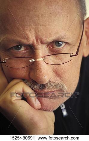 Portrait of a mature man thinking View Large Photo Image Stock Image - Portrait of a mature man thinking. Fotosearch