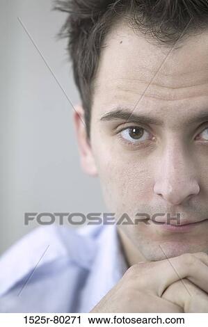 Portrait of a mid adult man thinking View Large Photo Image Stock Image - Portrait of a mid adult man thinking. Fotosearch