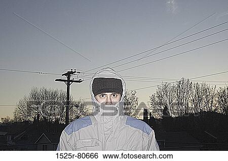 Portrait of a young man wearing warm clothes View Large Photo Image Stock Photograph - Portrait of a young man wearing warm clothes. Fotosearch