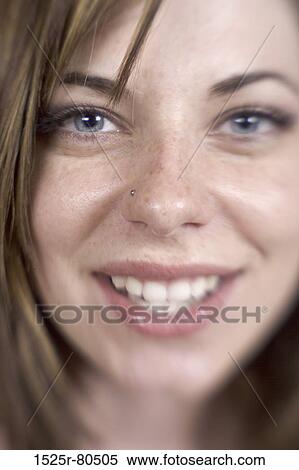 Portrait of a young woman smiling View Large Photo Image Stock Photography - Portrait of a young woman smiling. Fotosearch