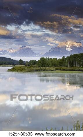 Reflection of clouds in a lake View Large Photo Image Stock Image - Reflection of clouds in a lake. Fotosearch