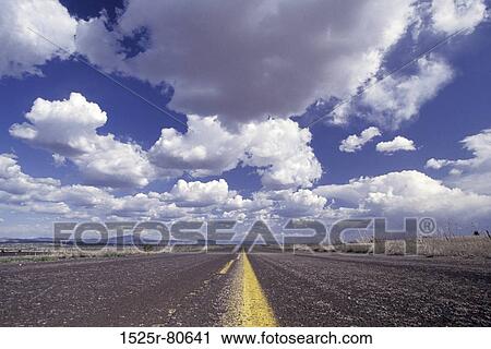 Road passing through a landscape View Large Photo Image Stock Image - Road passing through a landscape. Fotosearch