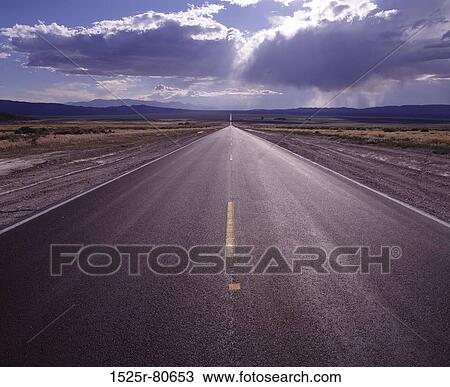 Road passing through a landscape View Large Photo Image Stock Image - Road passing through a landscape. Fotosearch