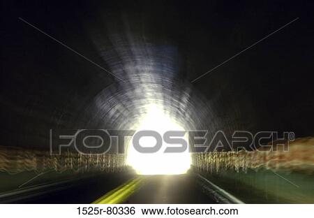 Stock Photograph - Road passing through a tunnel. Fotosearch