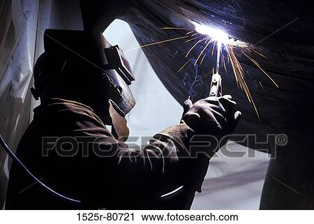 Side profile of a welder working with a welding torch View Large Photo Image Stock Image - Side profile of a welder working with a welding torch. Fotosearch