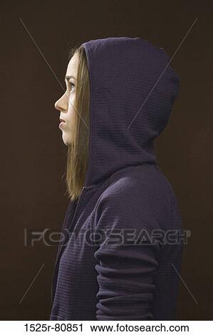 Side profile of a young woman thinking View Large Photo Image Stock Image - Side profile of a young woman thinking. Fotosearch
