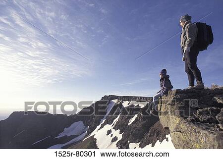 Side profile of two people on the hill View Large Photo Image Stock Image - Side profile of two people on the hill. Fotosearch