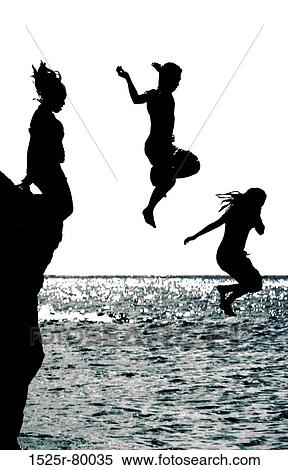 Silhouette of two girls and a boy jumping into the sea View Large Photo Image Stock Photography - Silhouette of two girls and a boy jumping into the sea. Fotosearch