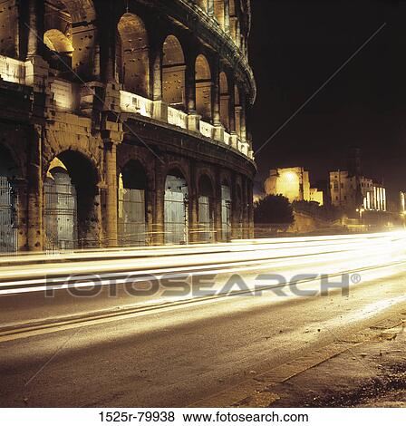 Traffic in front of a coliseum, Colosseum, Rome, Italy View Large Photo Image Stock Photo - Traffic in front of a coliseum, Colosseum, Rome, Italy. Fotosearch
