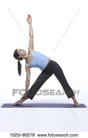 Stock Photo - Young woman doing yoga. Fotosearch