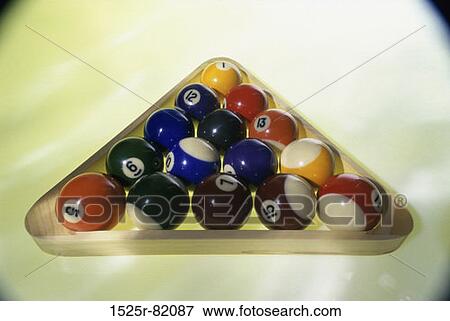 Billiard balls in a rack View Large Photo Image Stock Photo - Billiard balls in a rack. Fotosearch