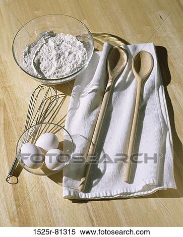 Bowl of flour near a whisk and eggs View Large Photo Image Stock Photography - Bowl of flour near a whisk and eggs. Fotosearch