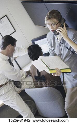Business executives in an office View Large Photo Image Stock Image - Business executives in an office. Fotosearch