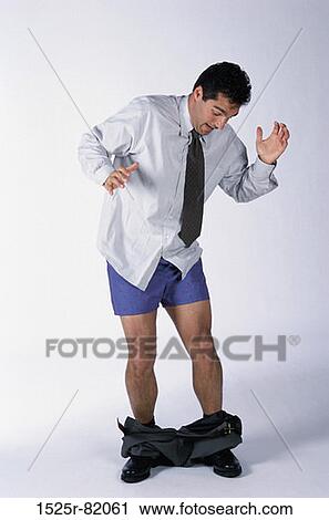 Businessman standing with his pants down View Large Photo Image Stock Image - Businessman standing with his pants down. Fotosearch