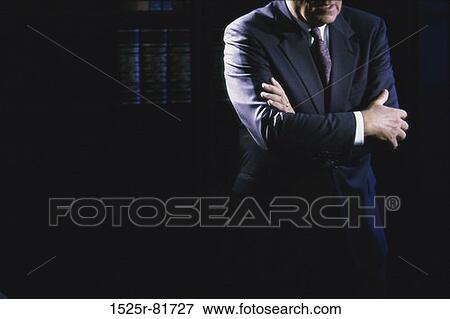 Businessman with his arms folded View Large Photo Image Stock Photo - Businessman with his arms folded. Fotosearch