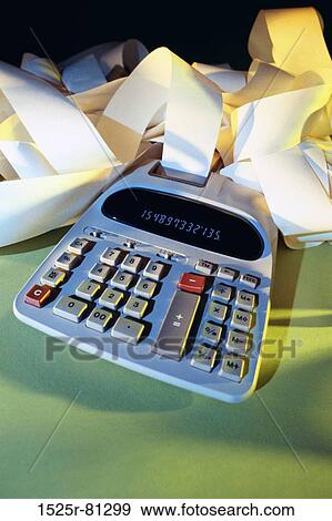 Close-up of a calculator and paper printout View Large Photo Image Stock Photo - Close-up of a calculator and paper printout. Fotosearch
