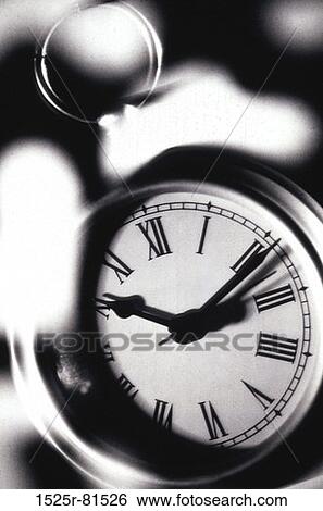Close-up of a clock View Large Photo Image Stock Photograph - Close-up of a clock. Fotosearch