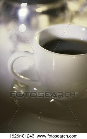 Stock Image - Close-up of a coffee cup. Fotosearch