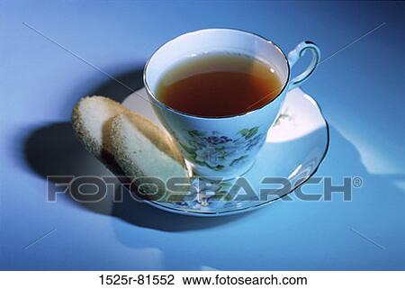 Close-up of a cup of tea and cookies View Large Photo Image Stock Image - Close-up of a cup of tea and cookies. Fotosearch
