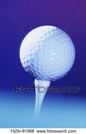 Close-up of a golf ball on a tee View Large Photo Image Stock Photo - Close-up of a golf ball on a tee. Fotosearch