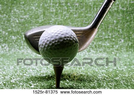 Stock Photography - Close-up of a golf club next to a golf ball. Fotosearch