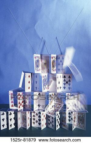 Close-up of a house of collapsing playing cards View Large Photo Image Stock Photo - Close-up of a house of collapsing playing cards. Fotosearch
