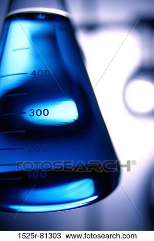 Close-up of a measuring beaker containing liquid View Large Photo Image Stock Image - Close-up of a measuring beaker containing liquid. Fotosearch