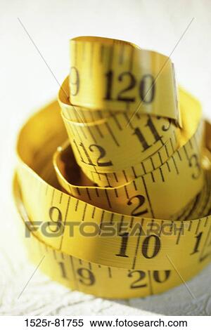 Stock Photography - Close-up of a measuring tape. Fotosearch