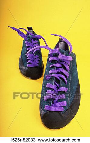 Close-up of a pair of sneakers View Large Photo Image Stock Image - Close-up of a pair of sneakers. Fotosearch