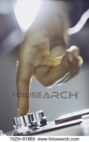 Close-up of a person's finger pressing a button View Large Photo Image Stock Photography - Close-up of a person's finger pressing a button. Fotosearch
