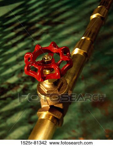 Close-up of a pipe and a valve View Large Photo Image Stock Image - Close-up of a pipe and a valve. Fotosearch