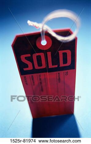 Close-up of a sold tag View Large Photo Image Picture - Close-up of a sold tag. Fotosearch