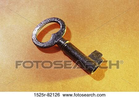Close-up of an antique key View Large Photo Image Stock Photograph - Close-up of an antique key. Fotosearch