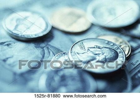Close-up of coins and paper money View Large Photo Image Stock Image - Close-up of coins and paper money. Fotosearch