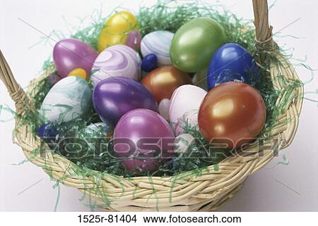 Close-up of Easter eggs in a basket View Large Photo Image Picture - Close-up of Easter eggs in a basket. Fotosearch