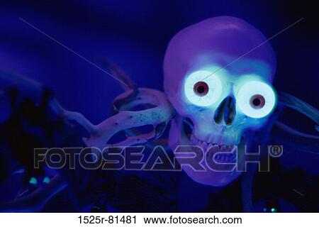 Close-up of glowing eyes in a human skull View Large Photo Image Stock Image - Close-up of glowing eyes in a human skull. Fotosearch