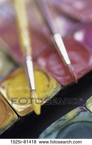 Close-up of paintbrushes on watercolors View Large Photo Image Stock Photo - Close-up of paintbrushes on watercolors. Fotosearch