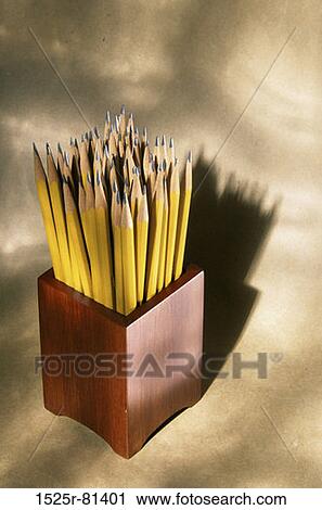 Stock Image - Close-up of pencils in a container. Fotosearch