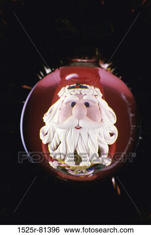 Close-up of Santa Claus on a Christmas ornament View Large Photo Image Stock Photograph - Close-up of Santa Claus on a Christmas ornament. Fotosearch