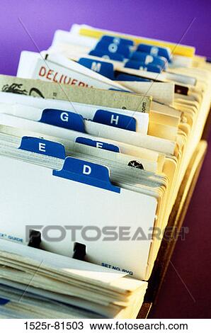 Stock Image - Close-up of the alphabet tabs on a rolodex. Fotosearch