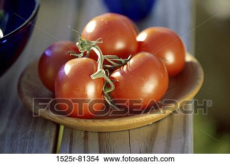 Picture - Close-up of tomatoes in a bowl. Fotosearch