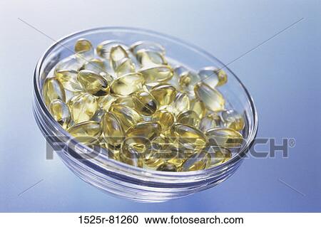 Close-up of vitamin capsules in a bowl View Large Photo Image Stock Image - Close-up of vitamin capsules in a bowl. Fotosearch