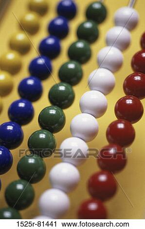 Colored beads of an abacus View Large Photo Image Stock Image - Colored beads of an abacus. Fotosearch